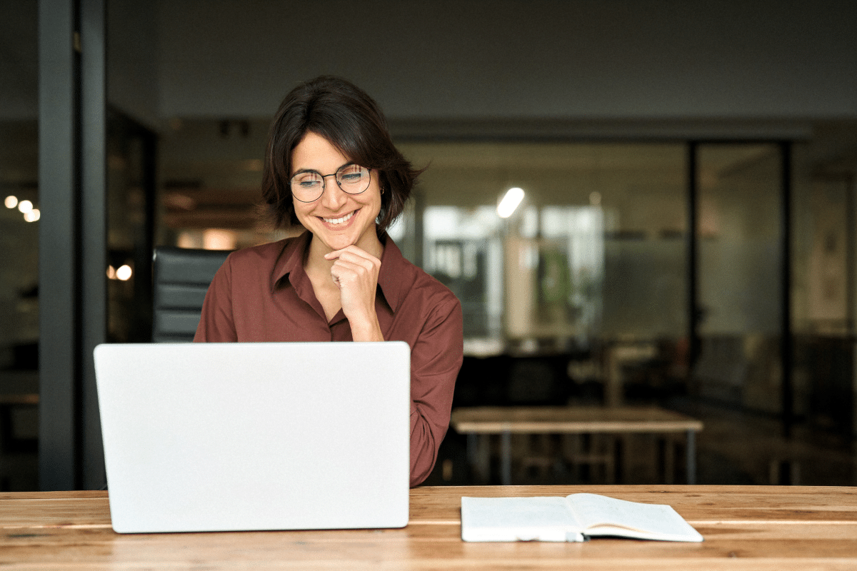 independent women and love compatible A happy, professional businesswoman working in her office